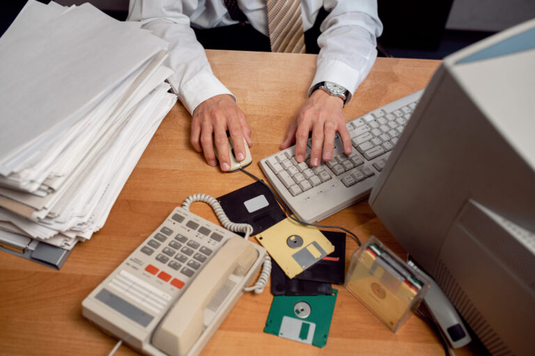 vintage-90-s-style-office-with-person-working-desk